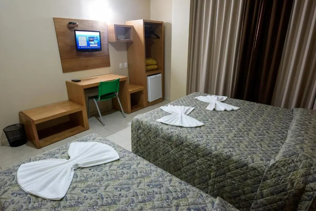 Prisma Plaza Hotel - Chambres