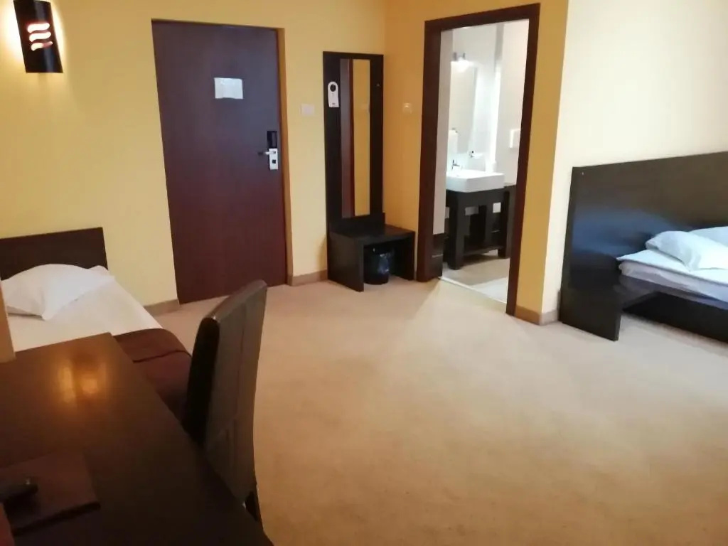 Maxim Hotel - Chambres
