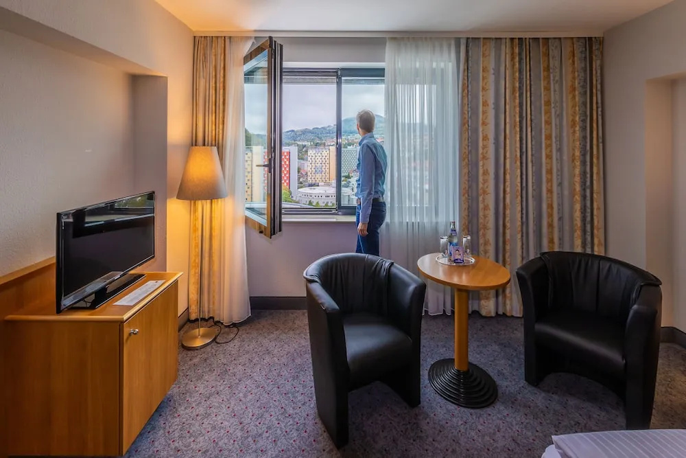 City Hotel am CCS - Chambres