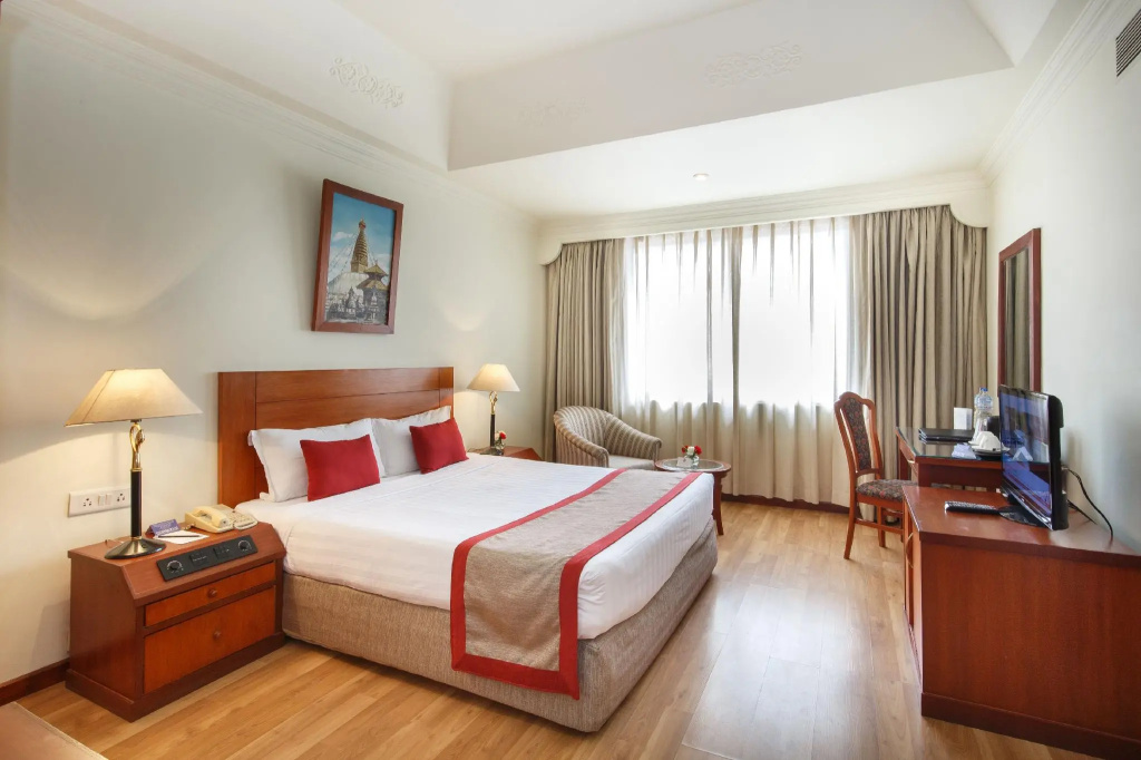 Deluxe Quadruple room with city view