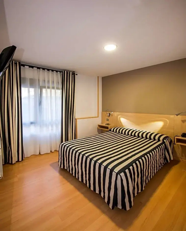 Hotel Puerta de la Santa - Chambres