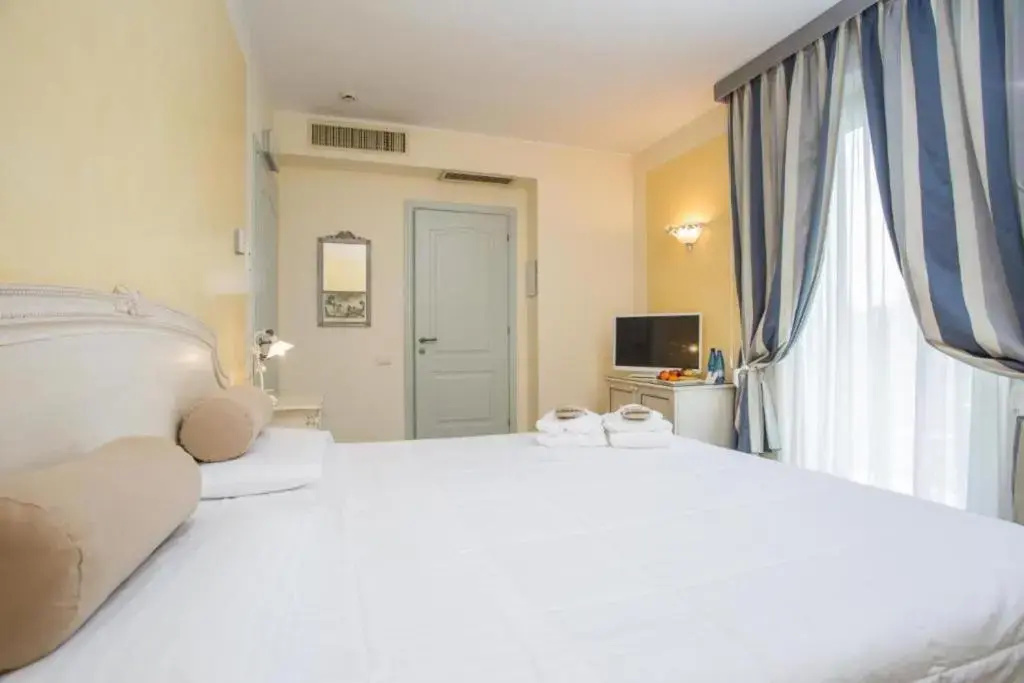 Hotel Spiaggia d'Oro - Charme & Boutique by Double Hospitality - Chambres