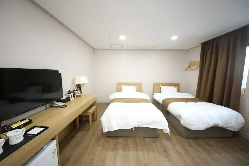 Hotel Aroha - Chambres