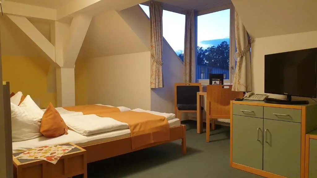 Hotel Regenbogenhaus - Chambres