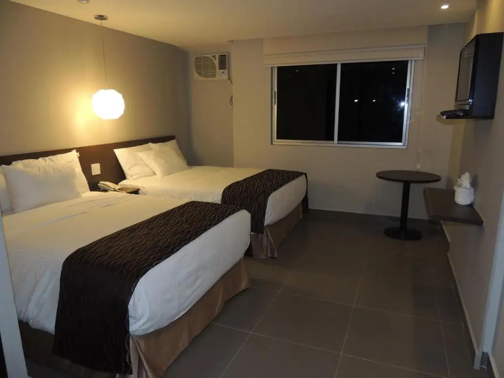 Hotel Ojos del Rio - Chambres