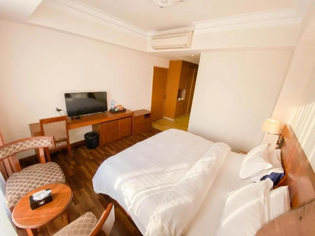 Esquire Hotel Apartments - Chambres