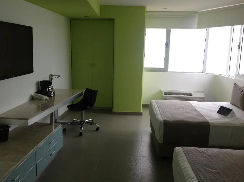 Standard Quadruple room beachfront