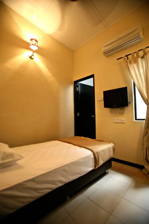 Etika Inn - Chambres