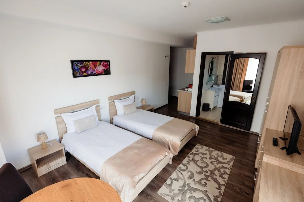 Aparthotel Punct pe i - Chambres