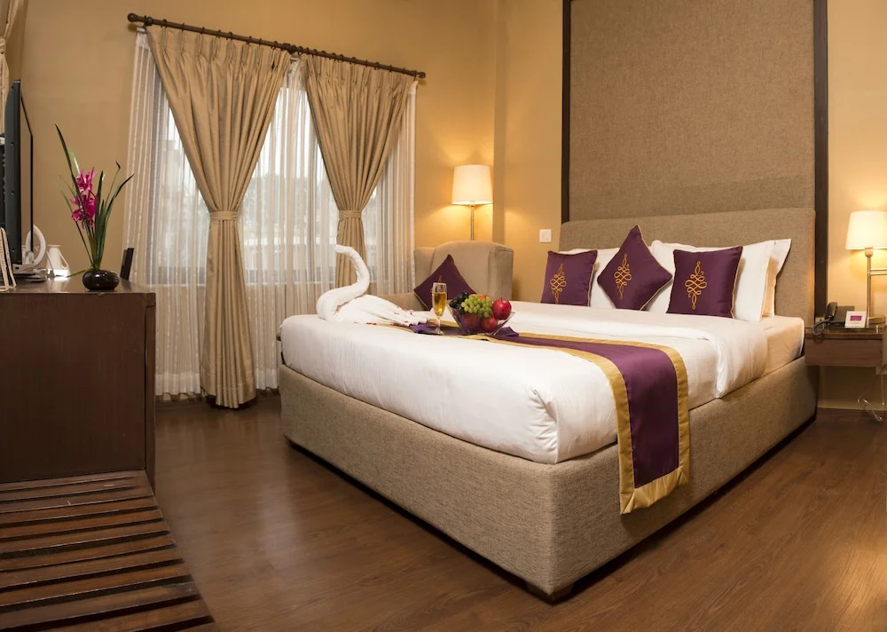 Deluxe Double room with balcony and with garden view (full double bed)