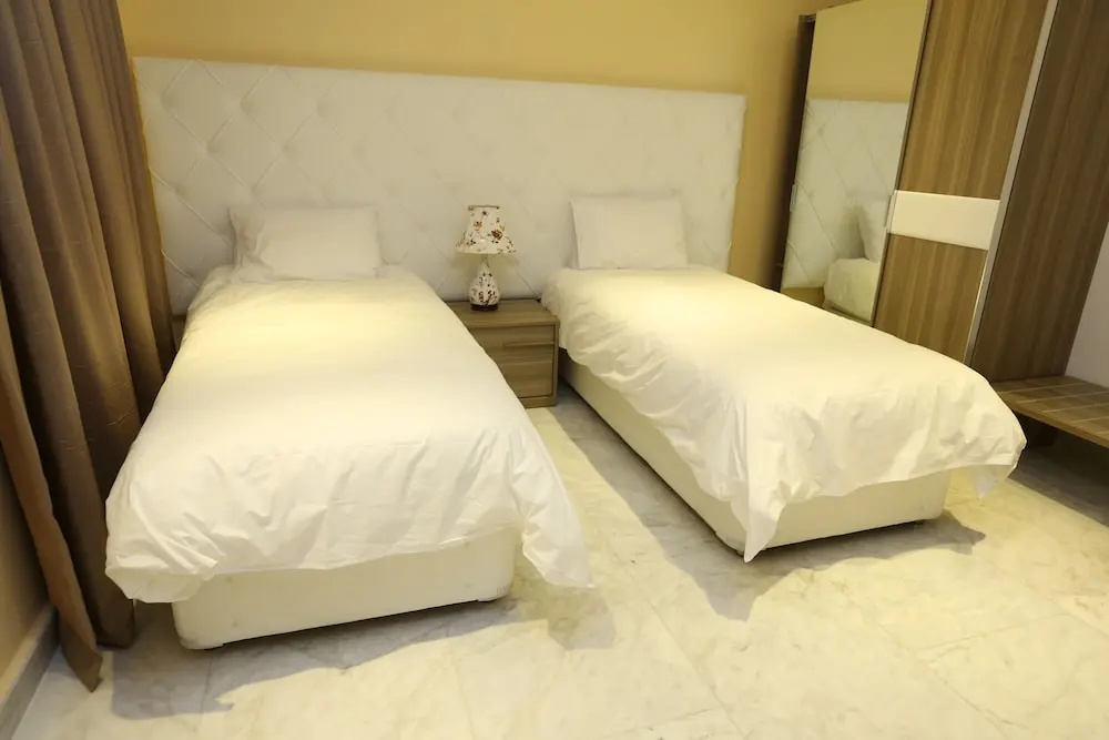 Delora Hotel and Suites - Chambres