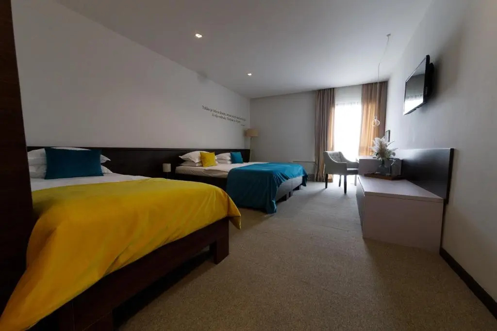 Hotel Emporium - Chambres