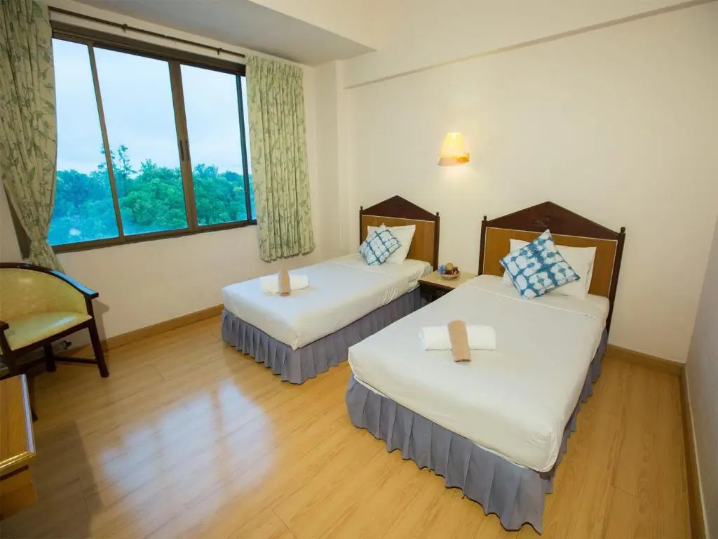 Phrae Nakara Hotel - Chambres