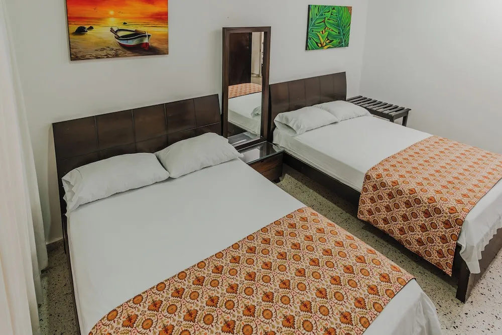 Casa Hotel Miriam - Chambres