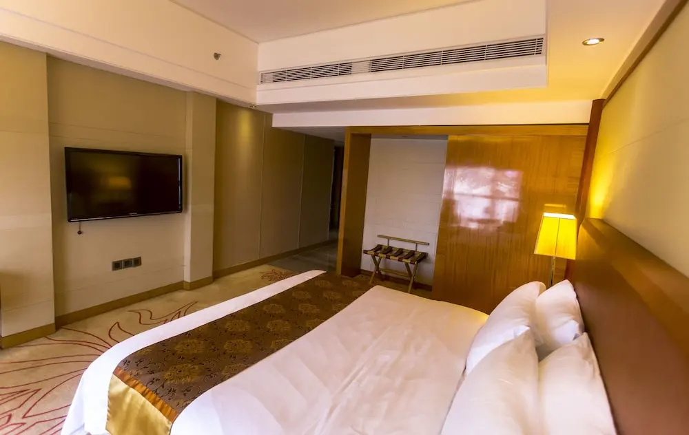 Manhattan Kinlen Hotel - Shishi - Chambres