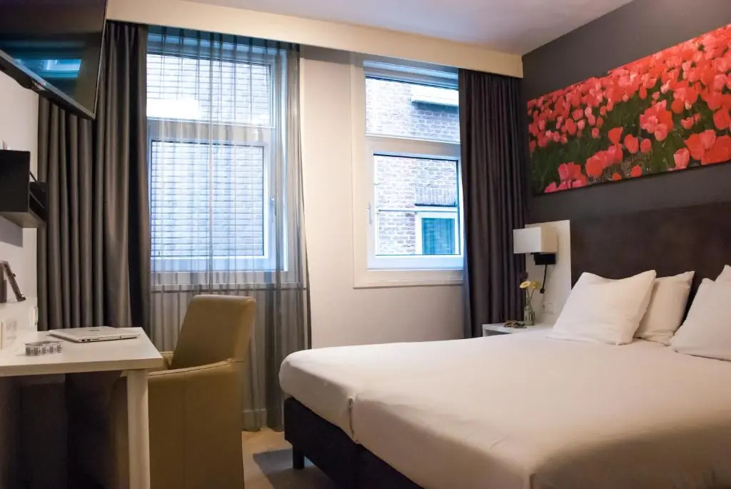 Hotel Amsterdam De Roode Leeuw - Chambres