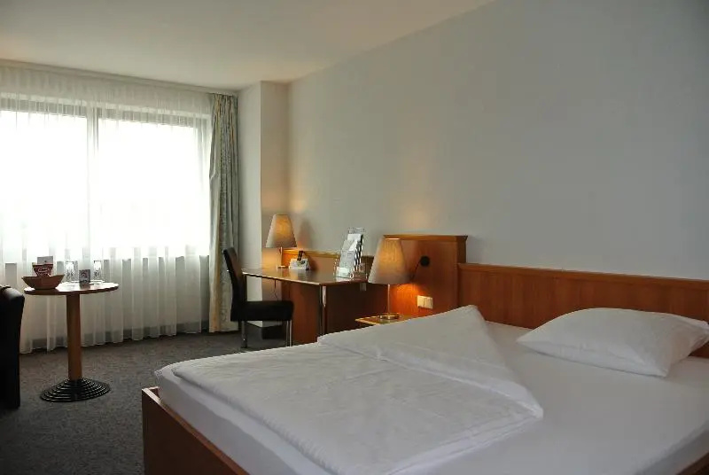 City Hotel am CCS - Chambres