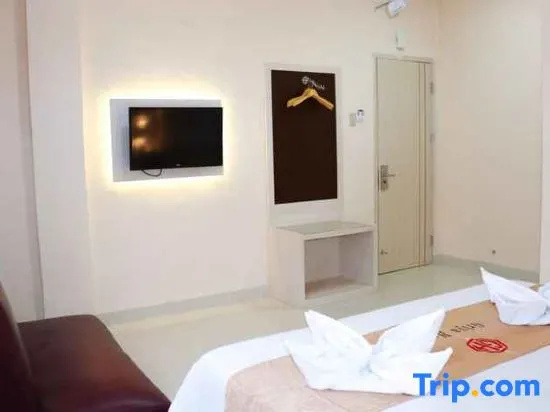 Griya Hotel - Chambres