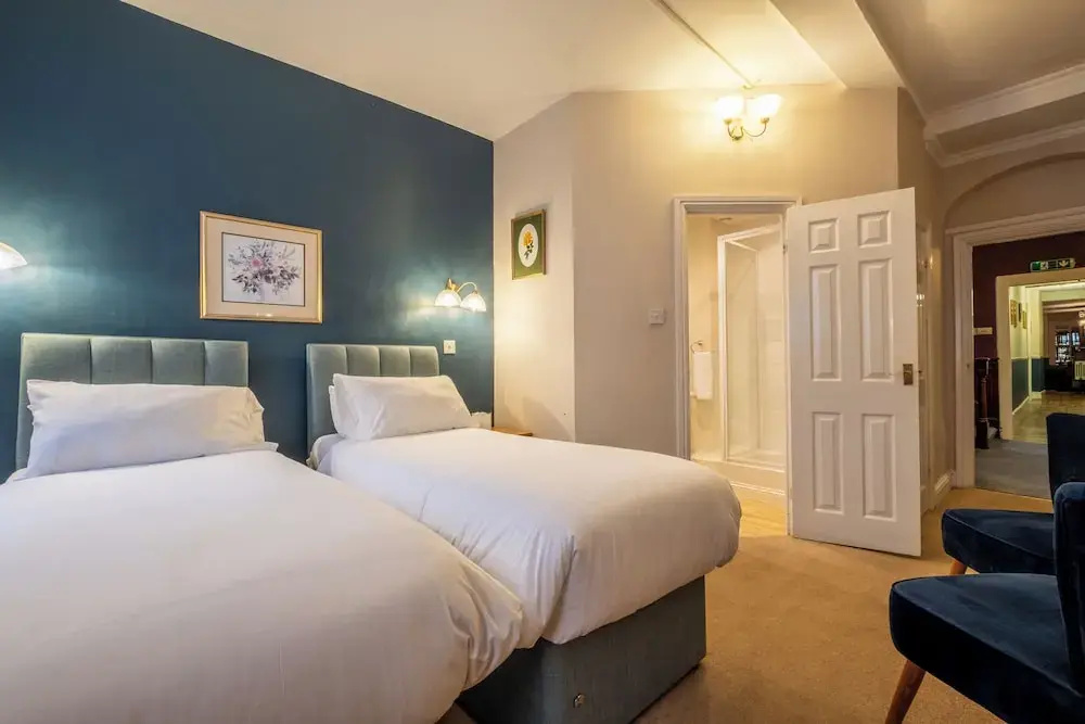Corinium Hotel & Restaurant - Chambres