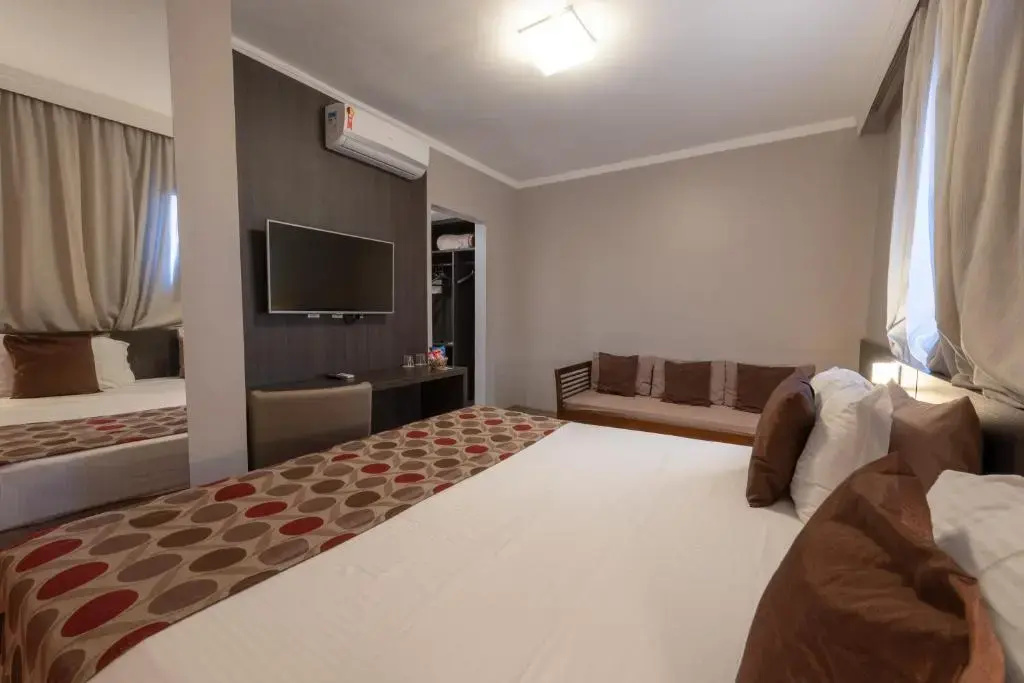 Class Hotel Guaxupé - Chambres