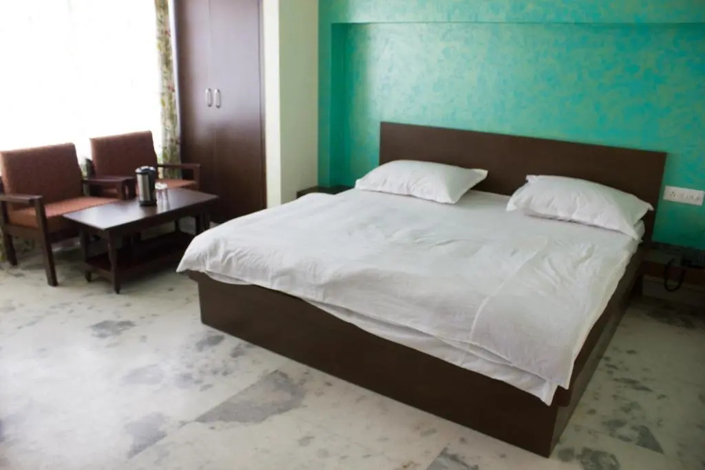 Hotel Holiday Home - Chambres