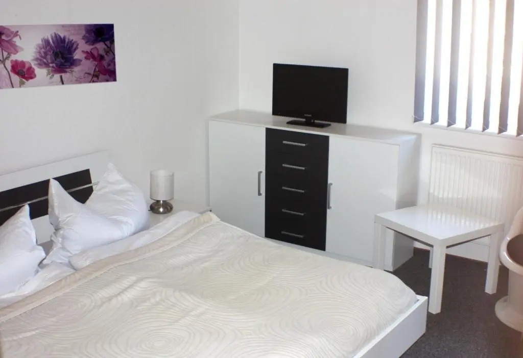 Café & Pension Am Brunnen - Chambres