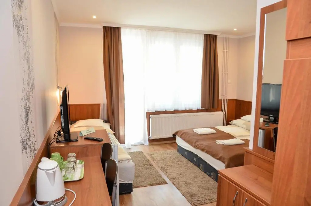 Media Panzió és Apartmanház - Chambres
