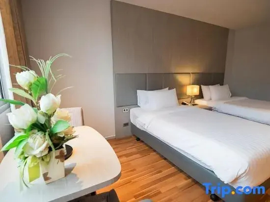 New Season Square Hotel - Chambres