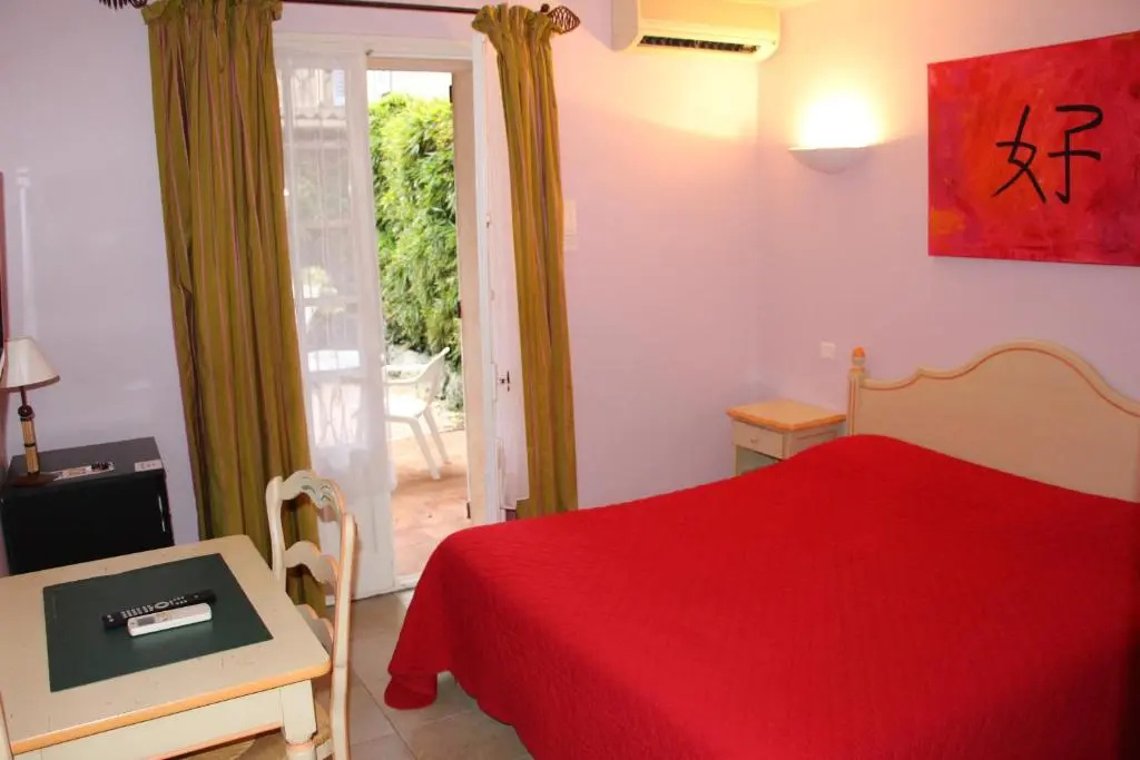 Htel Les Palmiers - Chambres
