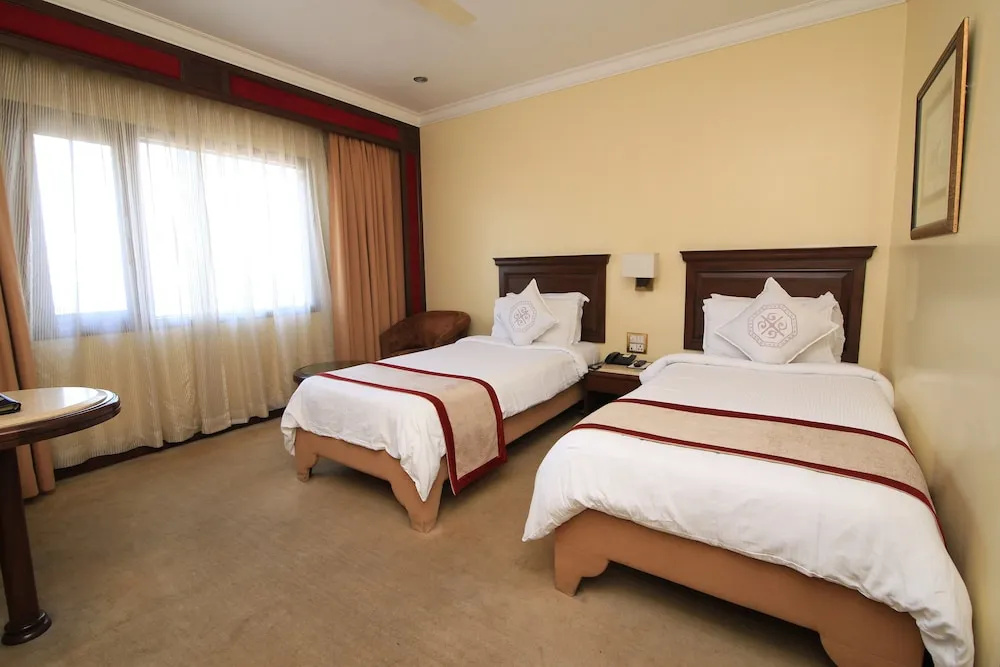 Dynasty Hotel - Chambres