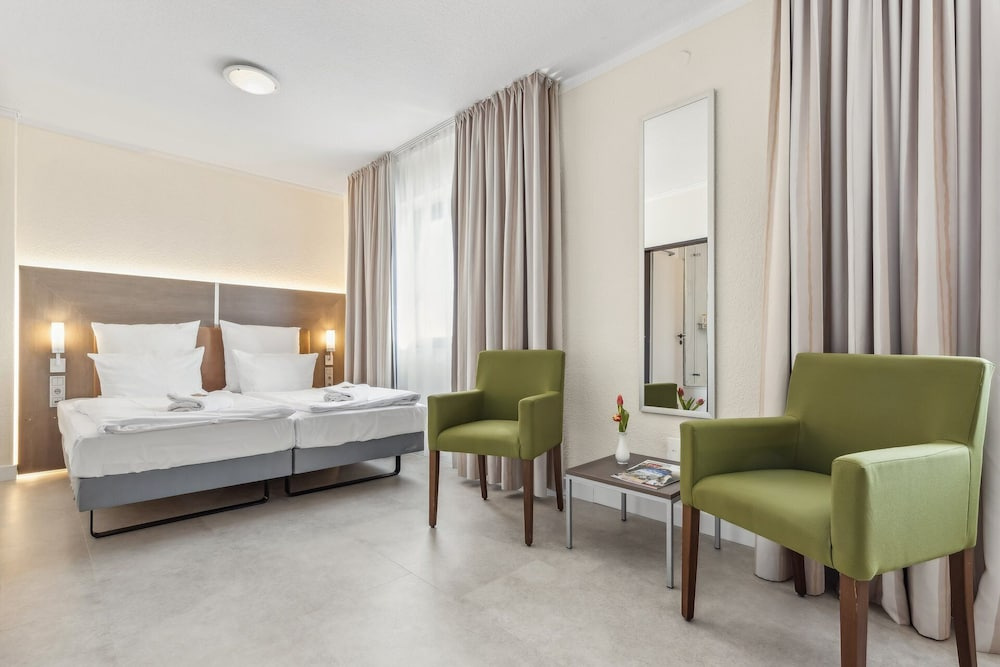 Cityhotel Amadeus - Chambres