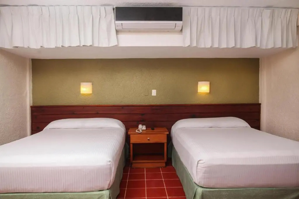 Hotel Casa Colonial Cozumel - Chambres