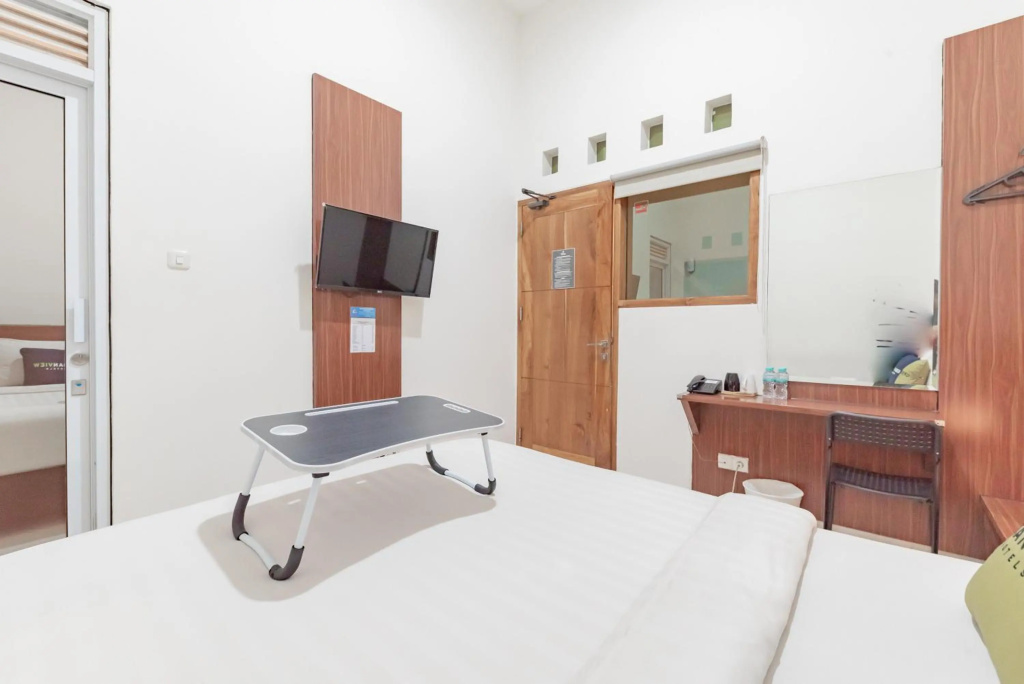 OYO Flagship 1308 Darmo Residence — 5