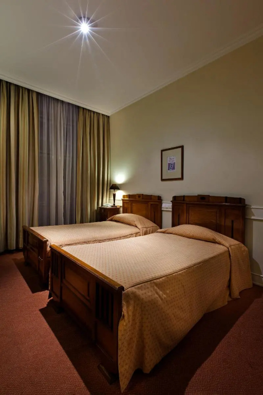 Hotel Metropole - Chambres