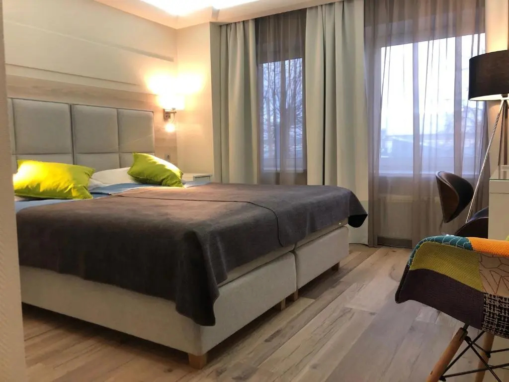 Amrita Hotel - Chambres