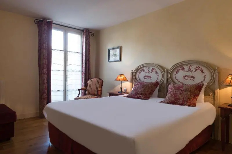 Hôtel Aux Vieux Remparts - Chambres
