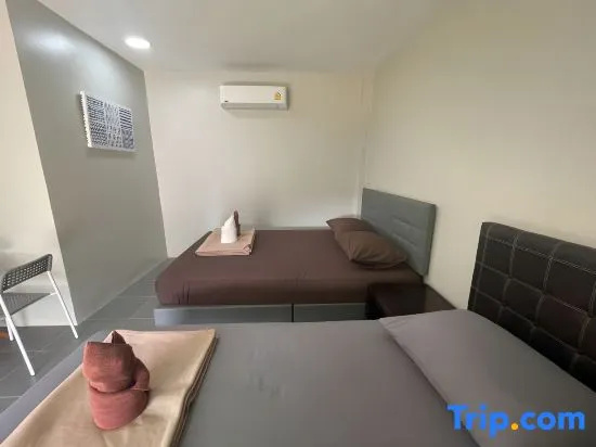 Standard Triple room with garden view