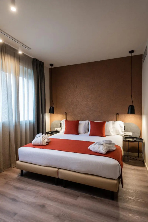 Atenea Rekord Suites Barcelona - Chambres