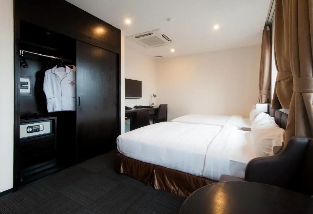 Sakura Hotel - Chambres