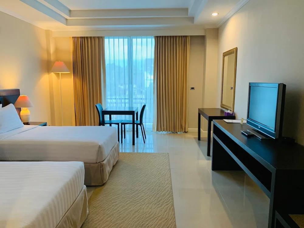 La Vie En Rose Hotel - Chambres
