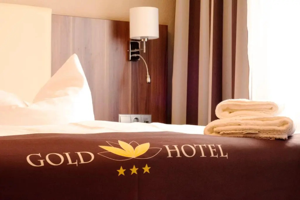 Gold Hotel - Chambres