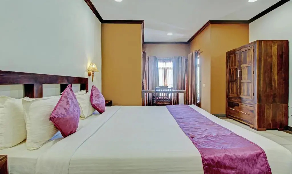 Treebo Premium Travancore Palace Cherthala - Chambres