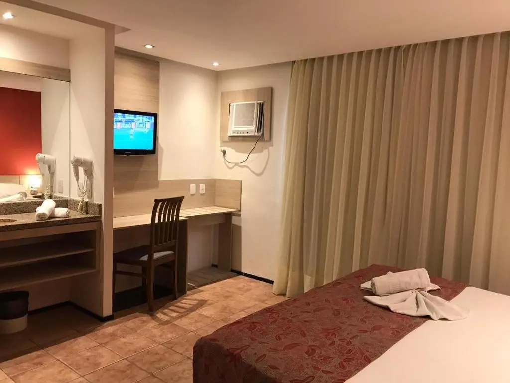Plaza Praia Suites - Chambres