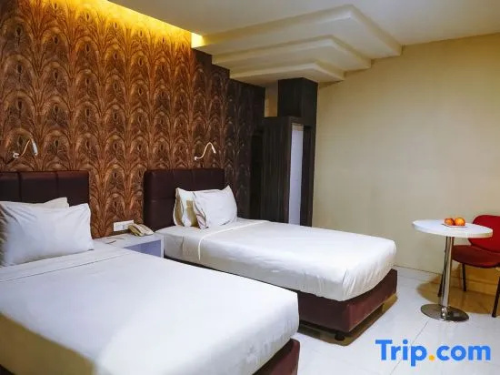 Empress Hotel Makassar - Chambres