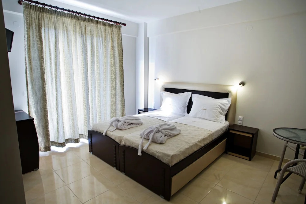 RG Status Hotel - Chambres
