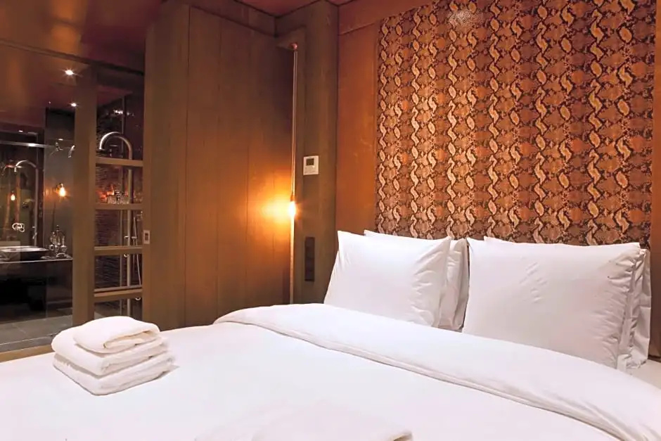 Manzo's Suites - Chambres