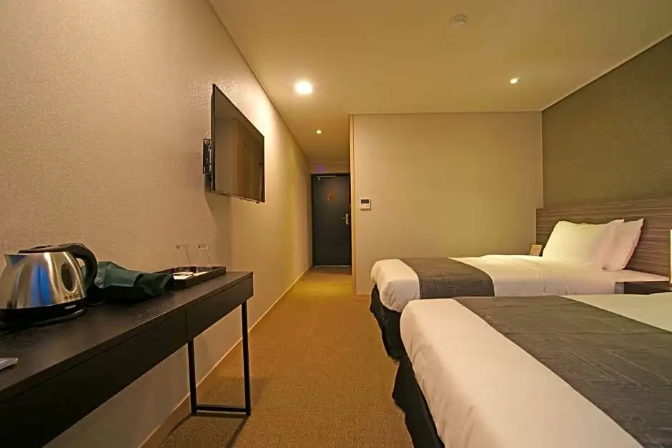 I-Jin Hotel - Chambres