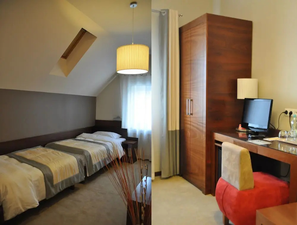 Atrium Hotel - Chambres