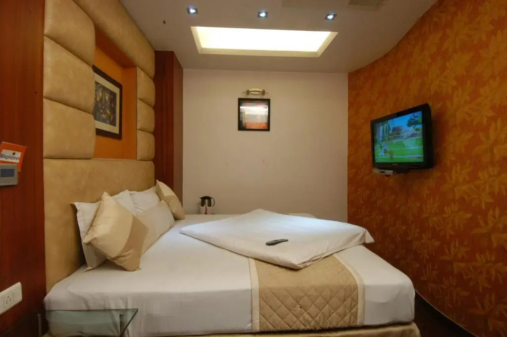 Trimrooms Palm D'or - Chambres
