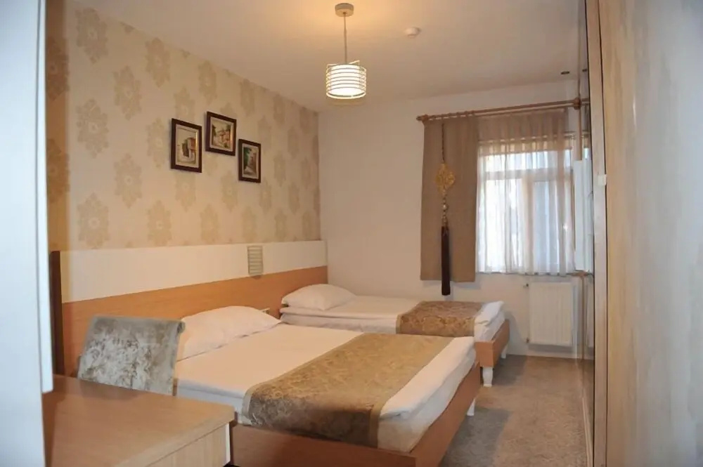 Esadas Hotel - Chambres